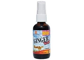 A bottle of Ginger Wow Syrup on a white background.