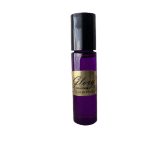 A bottle of Glory Anointing Oil on a black background.
